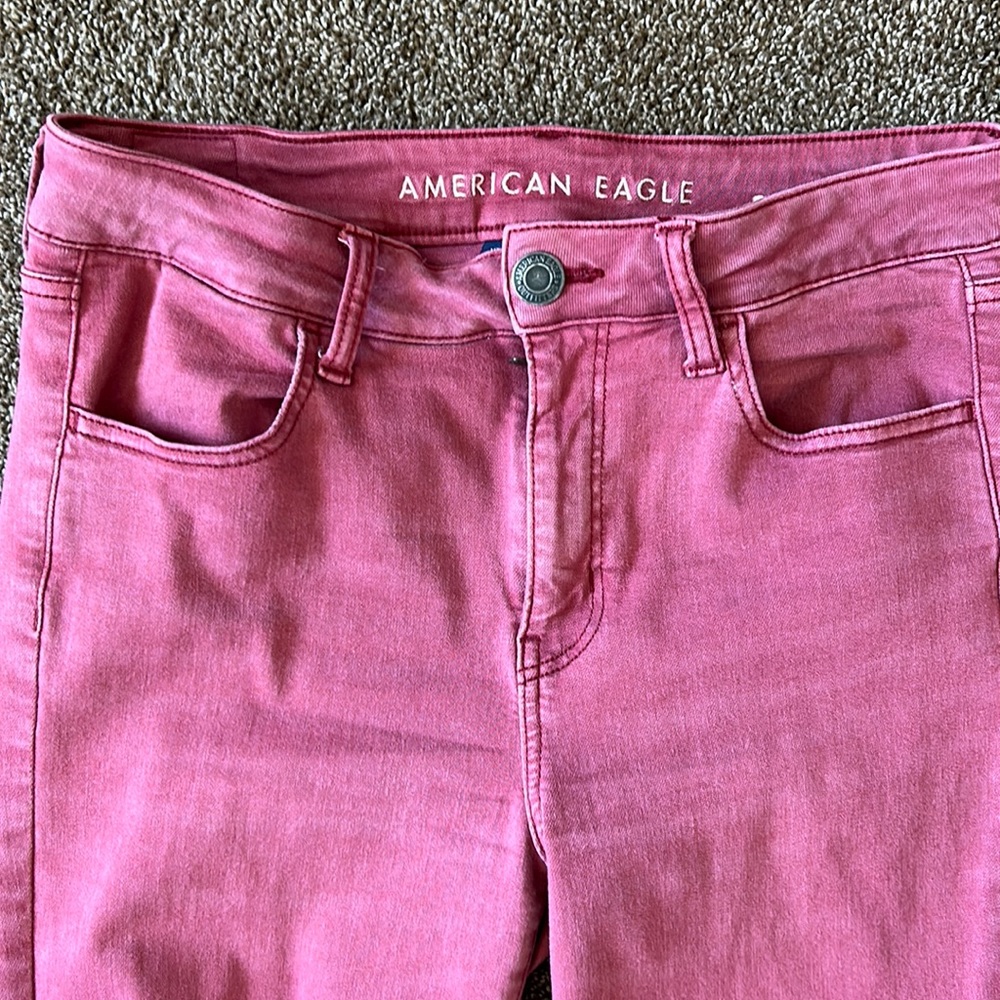 American Eagle light maroon skinny jeans